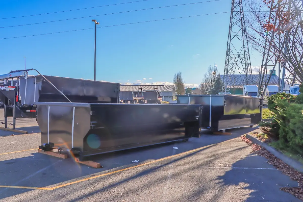 Roll-off dumpster ready for waste disposal at job site for 2 Yard Dumpster Rental in Allouez